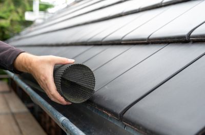 Seamless Gutter Cover Installation